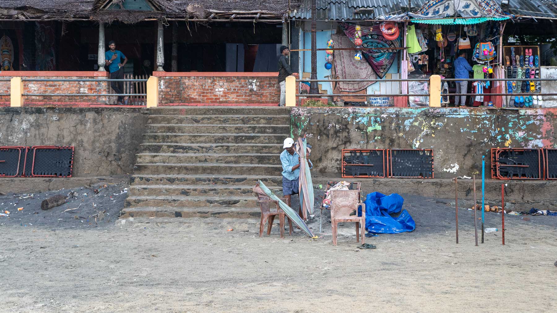 Umbrella selling man in kovalam kovalam - trivandrum,kerala