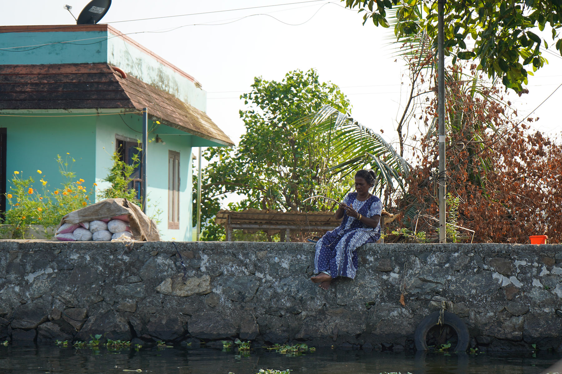 Fishing-lady-alappuzha-kerala-india-firstman